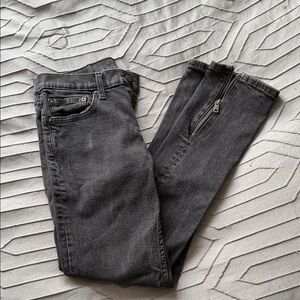 Levi’s black jeans with zip